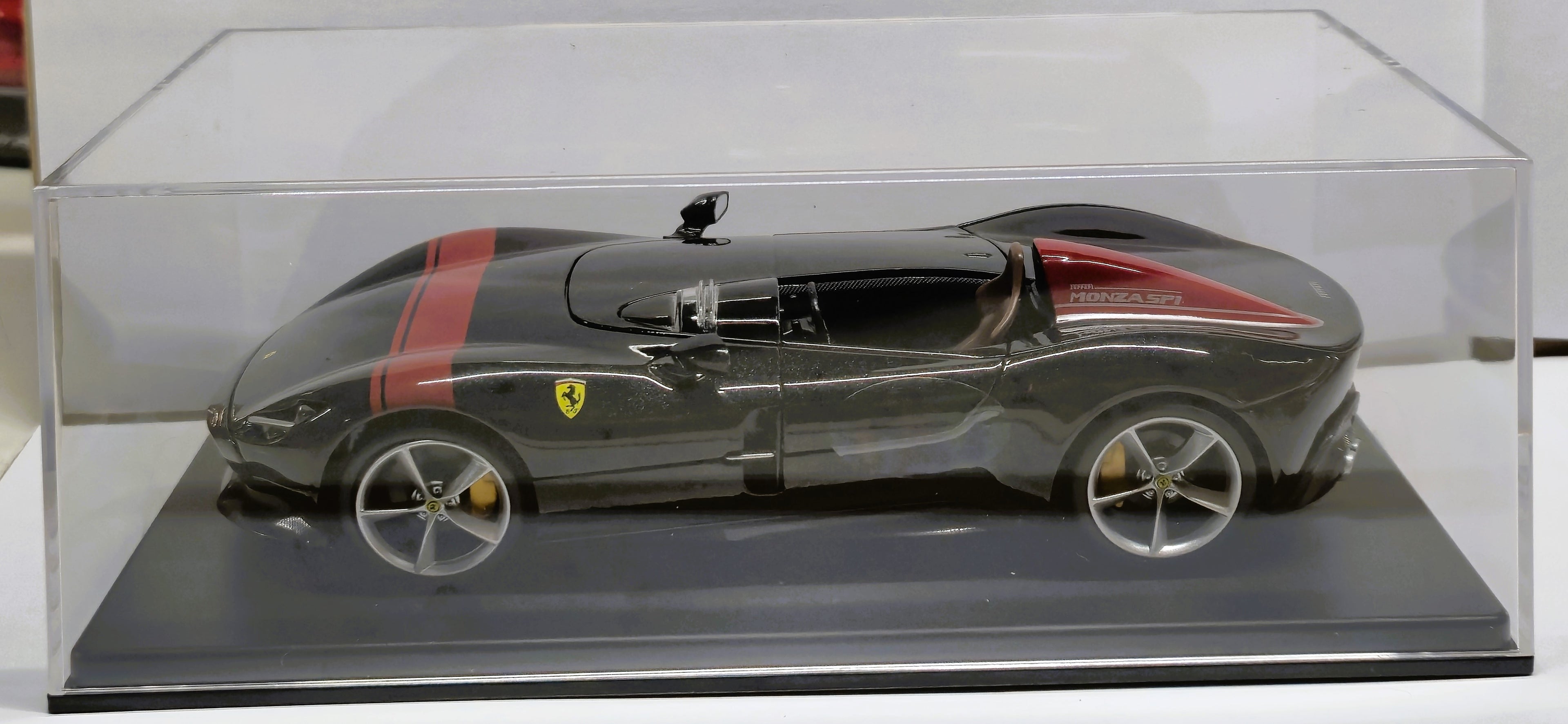 Ferrari Monza SP1 Black with Red Stripes 1/24 Diecast Model Car by Bburago