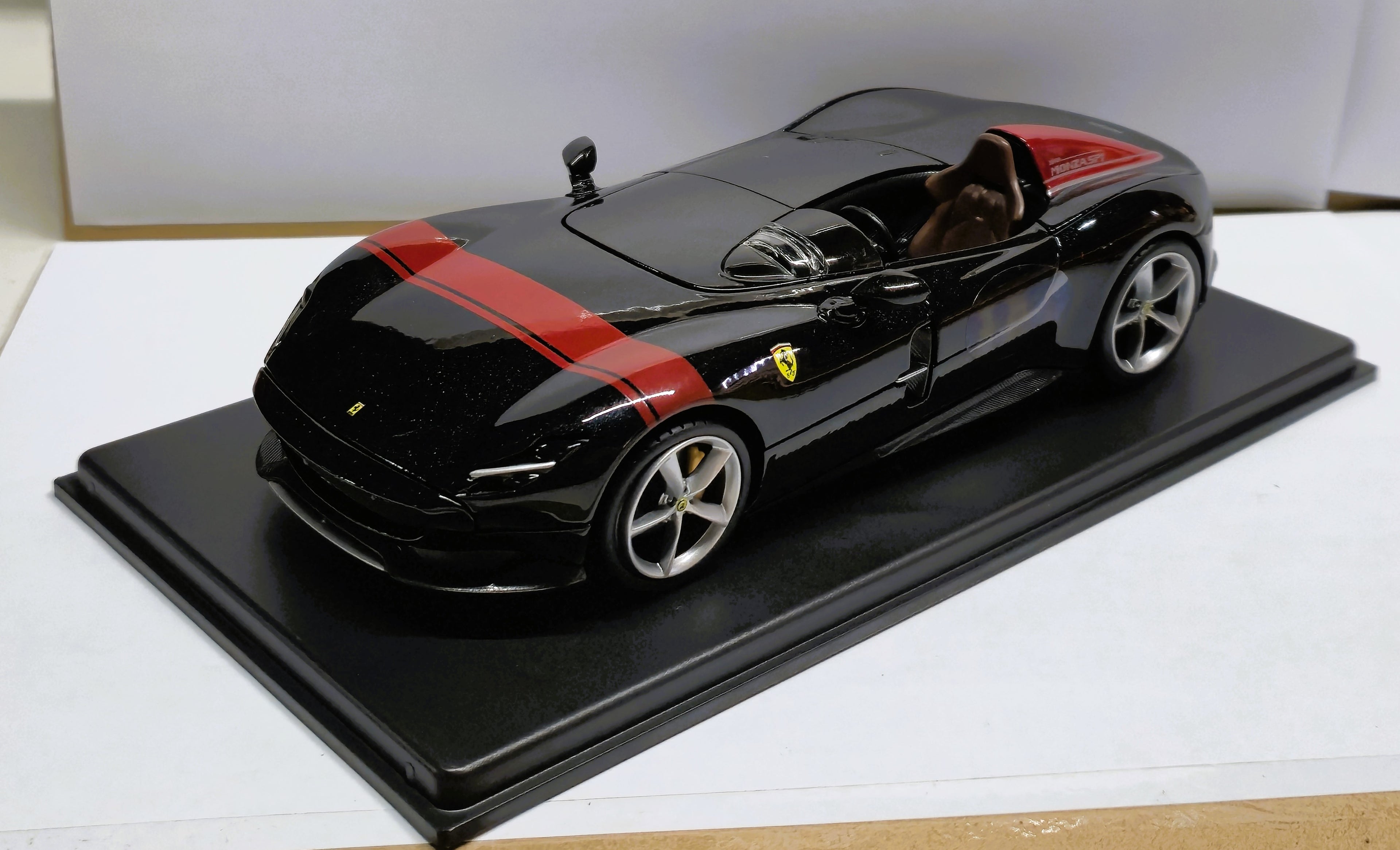Ferrari Monza SP1 Black with Red Stripes 1/24 Diecast Model Car by Bburago