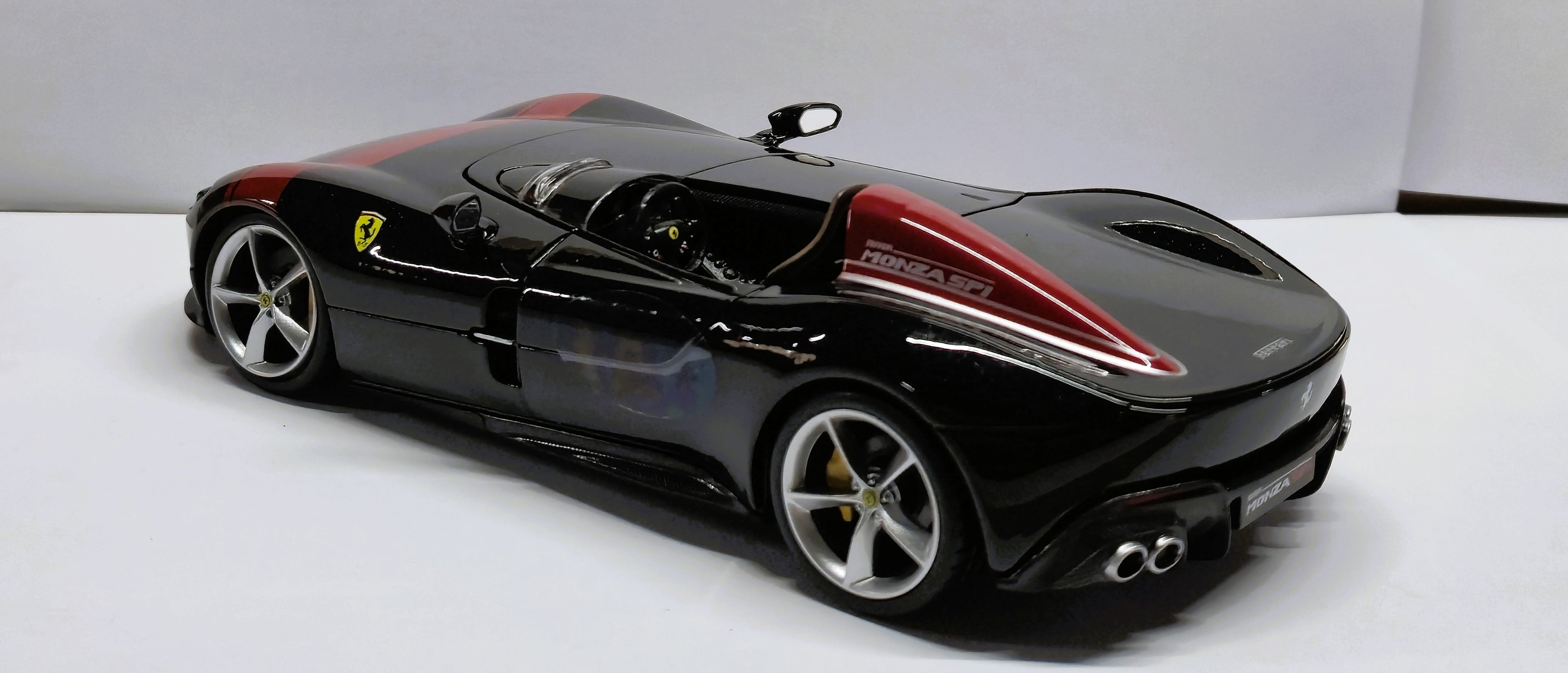 Ferrari Monza SP1 Black with Red Stripes 1/24 Diecast Model Car by Bburago