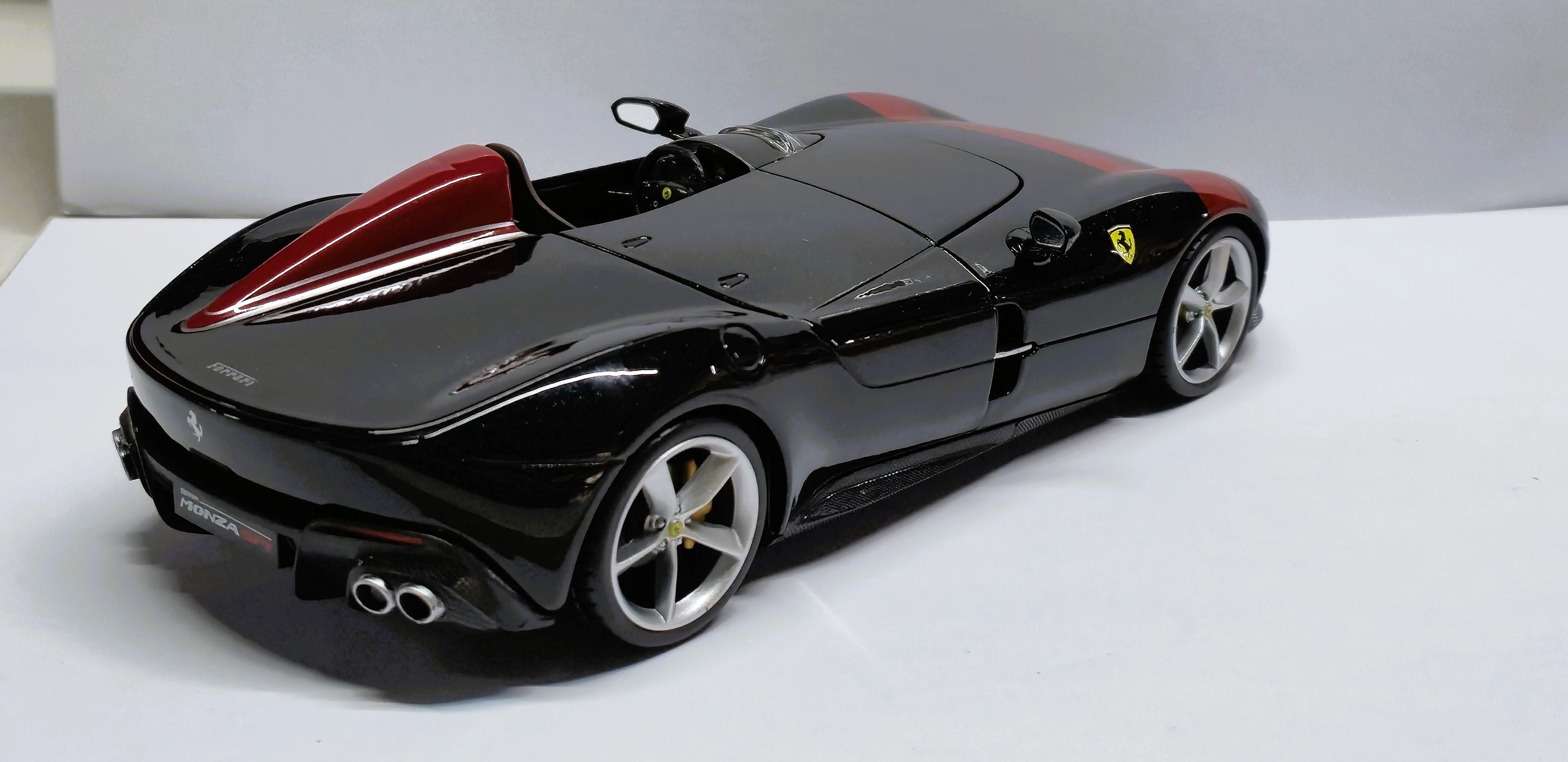 Ferrari Monza SP1 Black with Red Stripes 1/24 Diecast Model Car by Bburago
