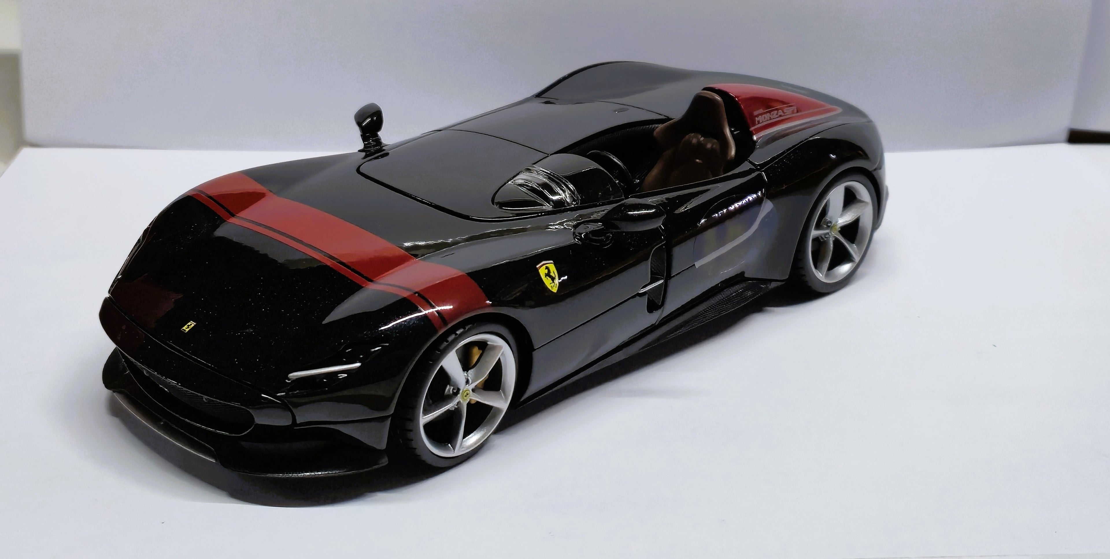 Ferrari Monza SP1 Black with Red Stripes 1/24 Diecast Model Car by Bburago